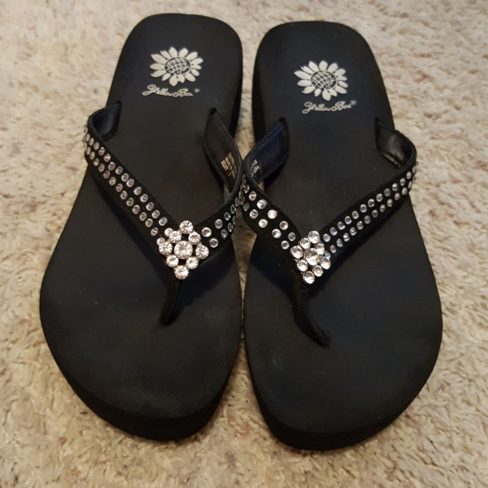 Yellow box flip flops